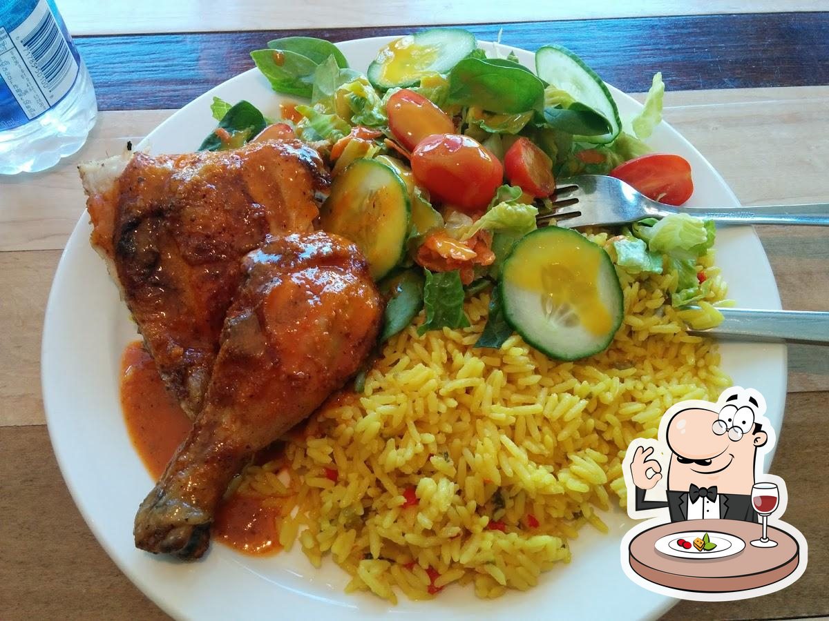 Grillades Pico Loco signature dishes Quarter Chicken LegHalf ChickenChicken SandwichPoutine with Portuguese Chicken